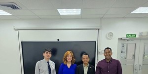 Representantes de la UTP y UPN en el salón de conferencias VIPE.